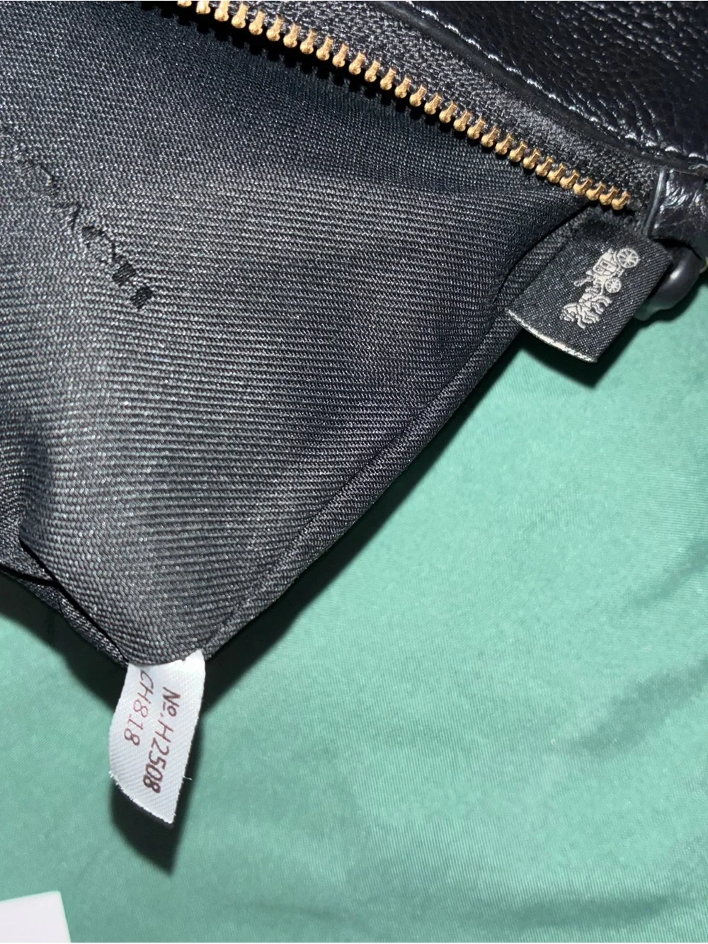 Coach Black Pebbled Leather Wristlet Phone Case with Gold Hardware